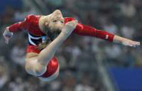 USA women's gymnasts stumble but recover - Team finals will be two-horse race between Americans, Chinese